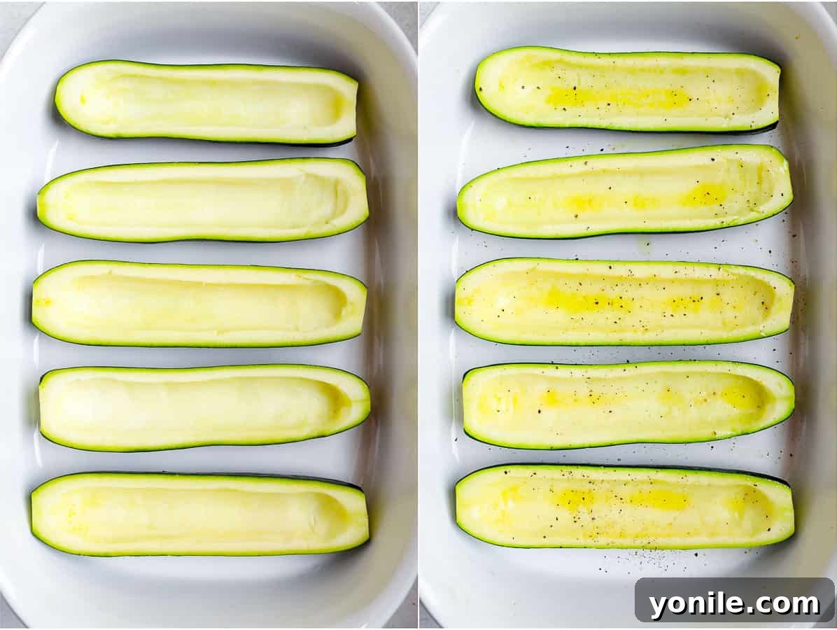 Freshly carved zucchini boats, prepped and ready for stuffing