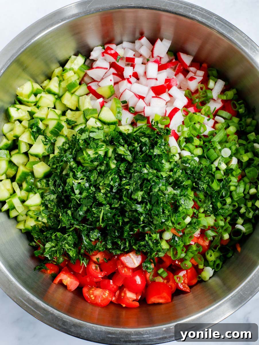 The chopped vegetables in a large bowl