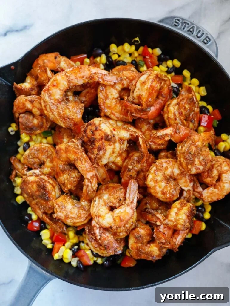 mexican shrimp on top of the veggies