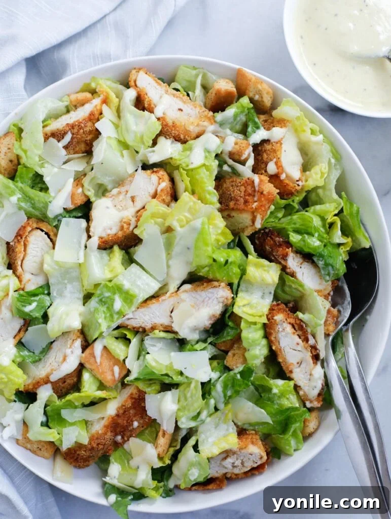 chicken caesar salad served in a elegant dish