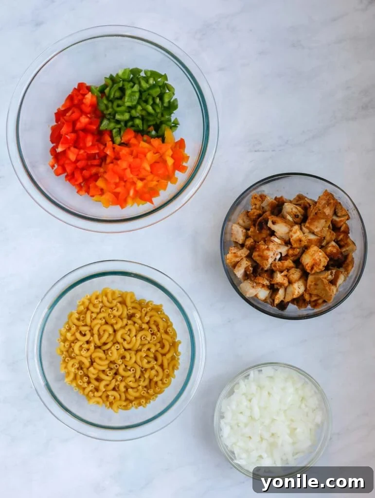 Sizzling Fajita Macaroni 3 Top down shot of ingredients for Fajita Chicken Mac and Cheese