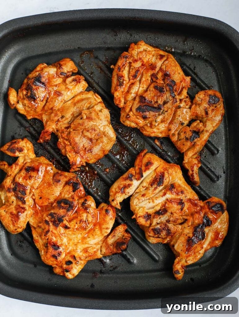 Sizzling Fajita Macaroni 4 Grilling fajita seasoned chicken in a skillet