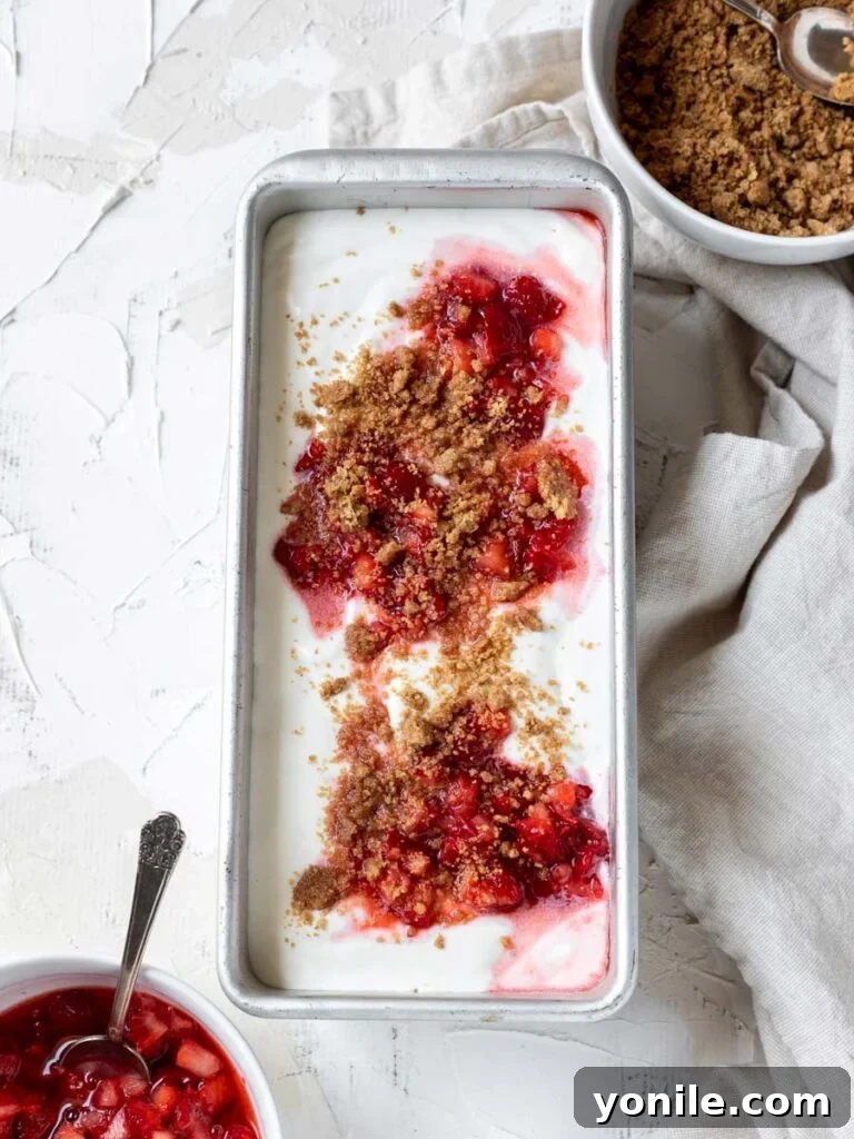Velvety Strawberry Cheesecake Delight 4 strawberries and ice cream in a pan