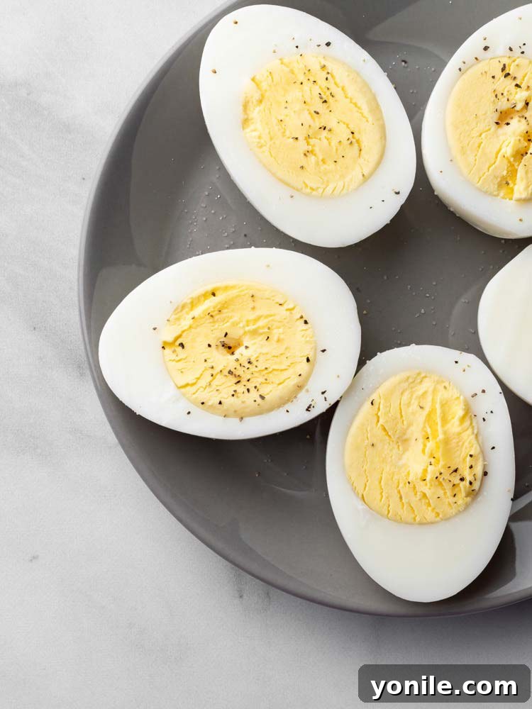 Delicious hard-boiled eggs cut in half and seasoned with salt and pepper