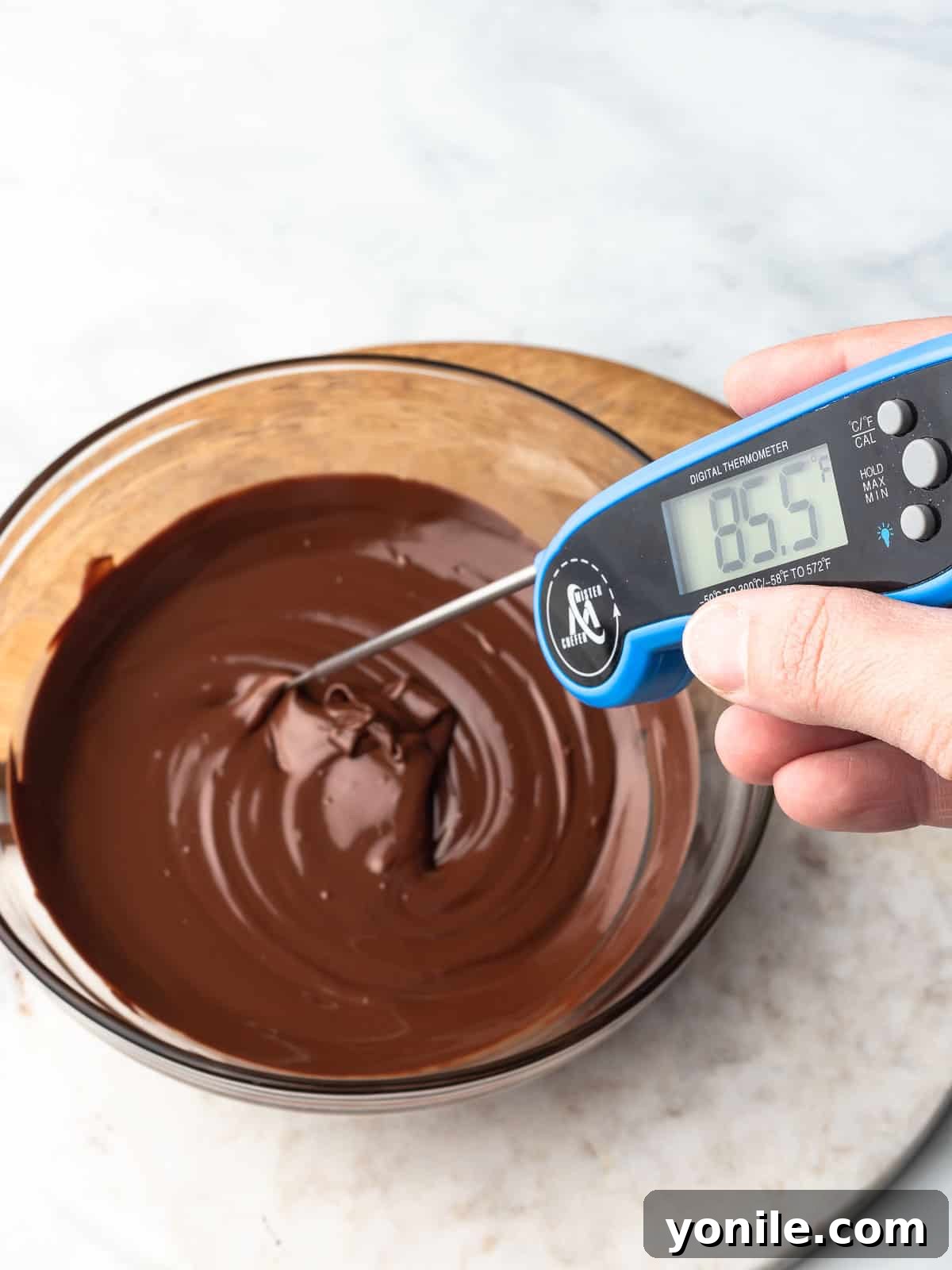 Mastering Chocolate Melting 3 Assortment of chocolate types for melting, including chips and bars.