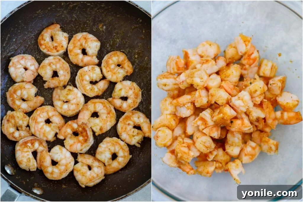 cooking shrimp in a skillet with spices, preparing for the avocado filling.