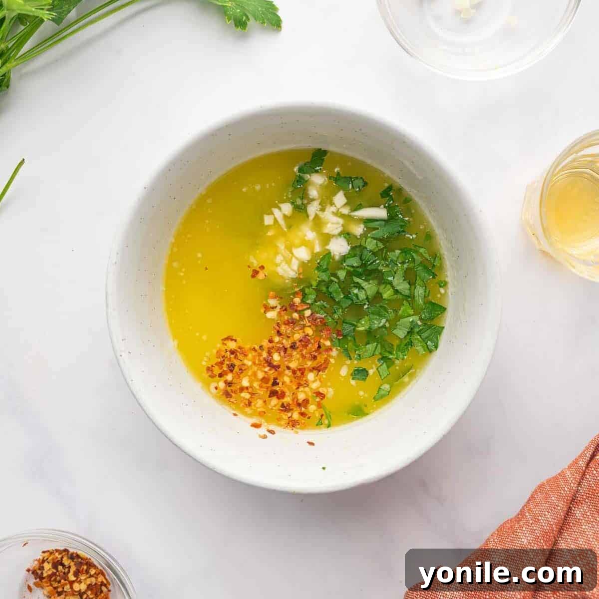 Chicken marinade is prepared in a bowl.